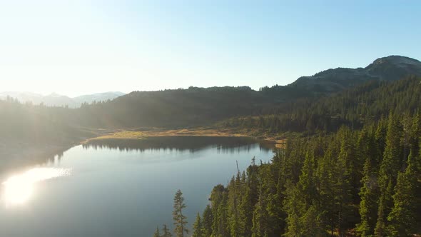 Aerial View of Beautiful Glacier Lake in the Canadian Mountain Landscape alt