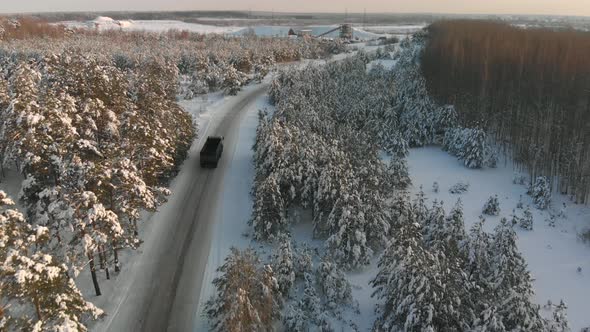 Truck Transporting Waste to a Waste Processing Plant in Winter alt