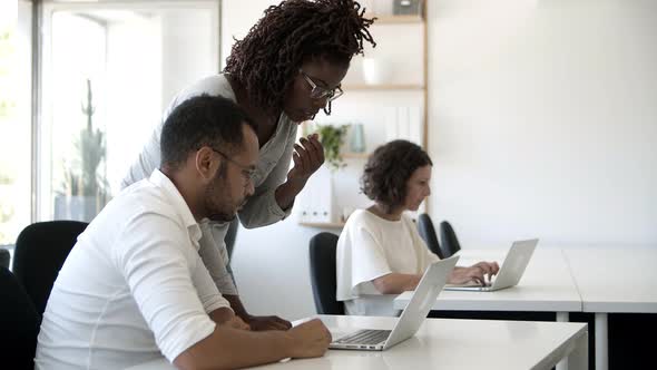 Focused Employees Working with Modern Devices alt