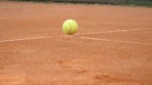Tennis ball to corner red ground field line