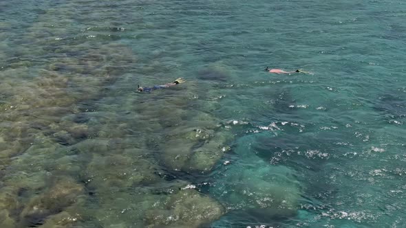 Scuba divers near Falasarna beach in Crete island, aerial view alt