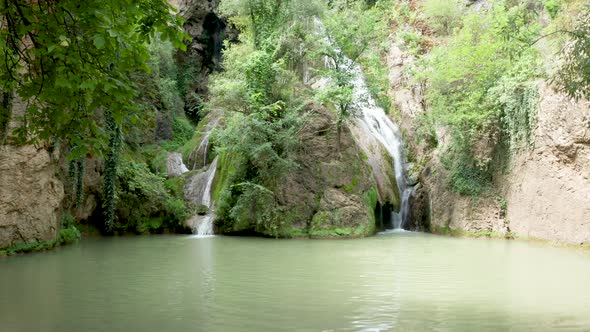 Gorgeous Waterfall in the Mountains alt