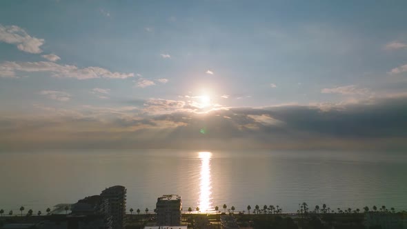 Sunset Over the Sea Flew Away Aerial View 4 K alt