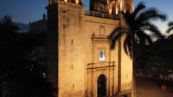 Aerial ascending nighttime extreme closeup of the towers of the Cathedral de San Gervasio in Vallado alt