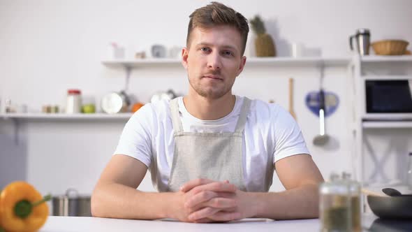 Handsome Young Chef Smiling Into Camera, Ad of Culinary Courses, Nutrition Tips alt
