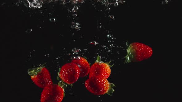 Strawberries Fall In Water