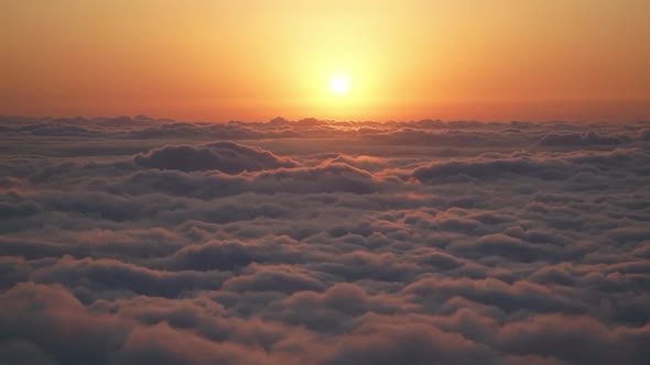 8K Amazing Sunset Over the Clouds