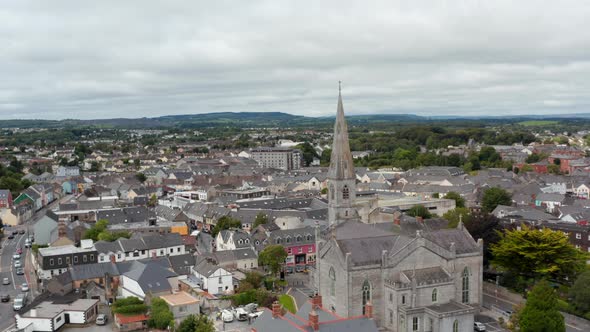 Aerial Footage of Cathedral of Saints Peter and Paul and Town in Background alt
