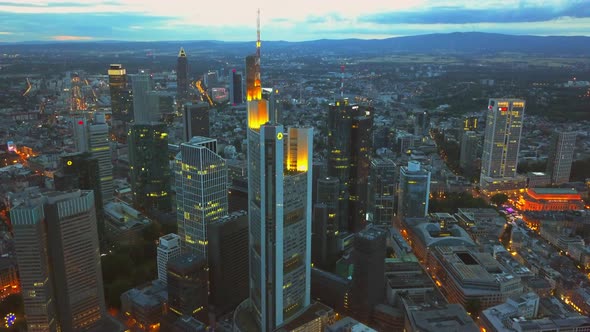 AERIAL: View of Frankfurt Am Main, Germany Skyline at Night,City Lights, Traffic,Movement alt