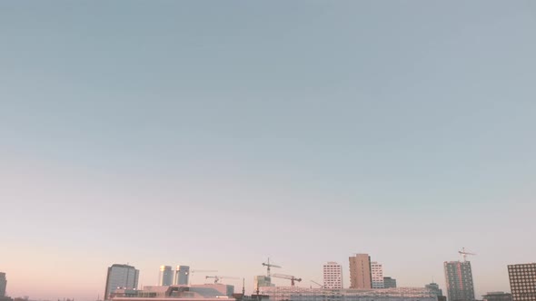 Panning up over the rooftops of the historic centre of the city of Utrecht in The Netherlands with p alt