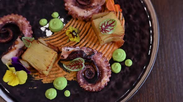 Octopus with Potatoes on Pea Mash