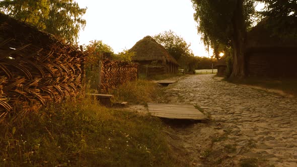 Moving Along Stone Pathway in Old Ancient Village alt