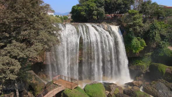 Aerial Shot of the Elephant Waterfall in the City of Dalat in the Southern Part of Vietnam alt