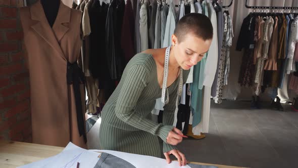 Above View of Young Caucasian Tailor at Work alt