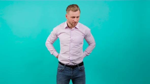 Young Handsome Man Who Gives a Surprise Gift Box, Looking at the Camera alt