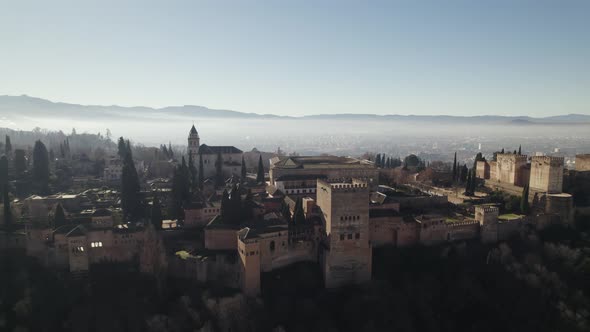 Aerial view of vast Alhambra fortress complex atop Sabika Hill, Granada