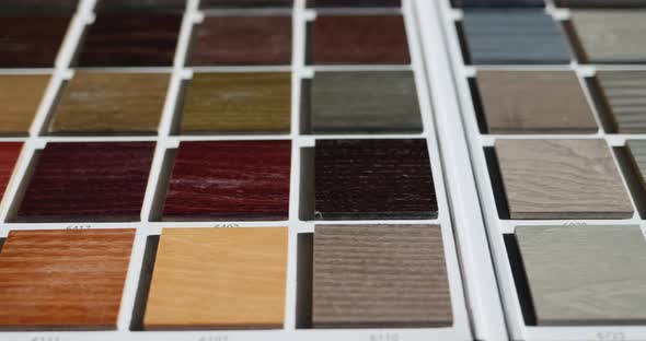 Slider Shot Palette with Painted Wood Samples to Select the Color of Wood Products alt