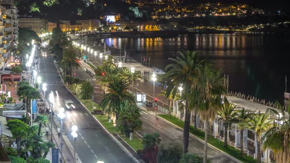 Night Aerial Panorama of Nice Timelapse, France. Lighted Old Town Little Streets and Waterfront alt