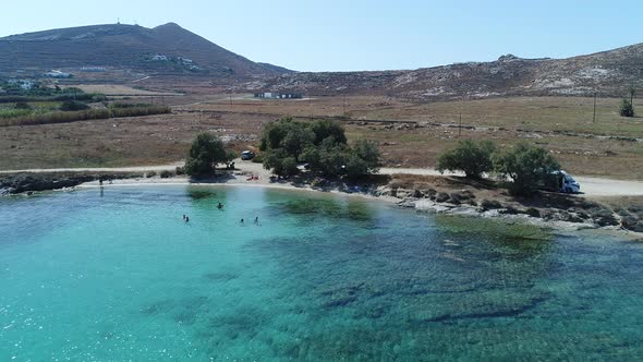 Piperi beach in Naoussa on Paros island in the Cyclades in Greece aerial view alt