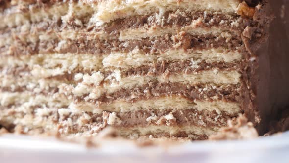 Layers of tasty torte with biscuits 4K 2160p 30fps UltraHD tilting footage - Creamy  chocolate cake  alt