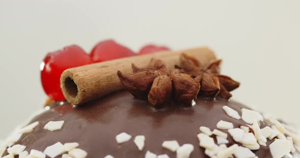 Sweet Easter Cake Decorated With Red Cherries, Star Anise And Cinnamon