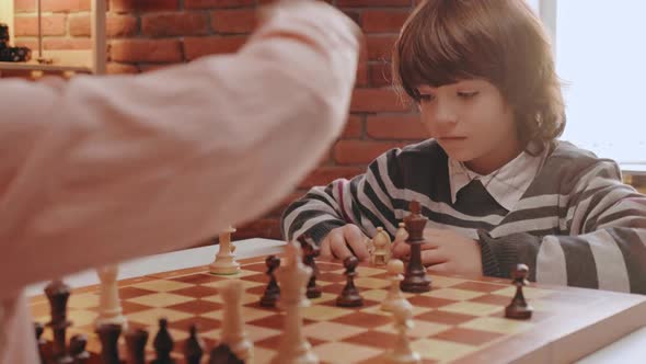 Two Boys Playing Chess