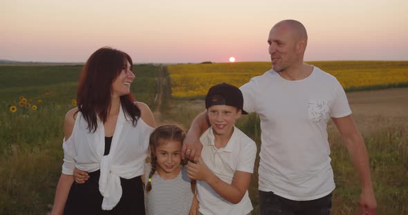 Family With Children Outdoors On A Sunny Summer Day 01