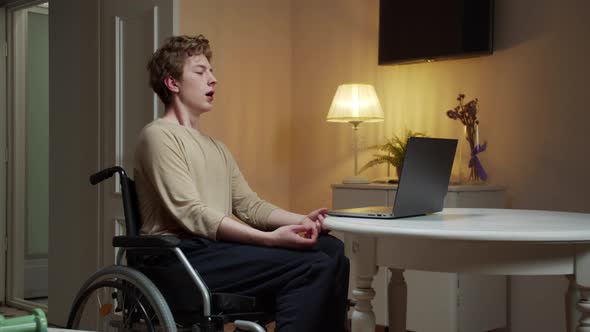 A Disabled Young Man Id Meditating in Silence alt