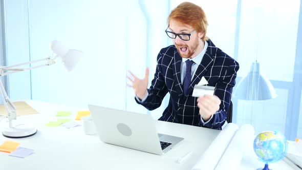 Redhead Businessman Excited for Online Shopping, Payment by Credit Card alt