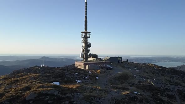 Ulriken tower over Bergen, Norway with a revealing shot of the city