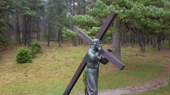 Jesus Christ Statue in Forest