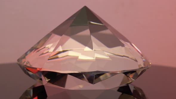 Side View of a Sparkling Pink Diamond with Round Embossed alt