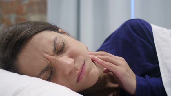 Sleeping Woman Suffering Teeth Pain, Toothache alt