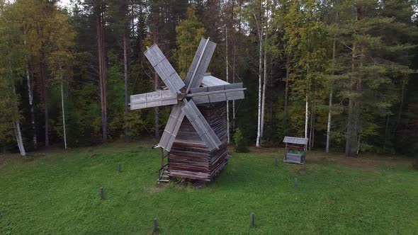 Flying with a Drone Over a Traditional Wooden Windmill