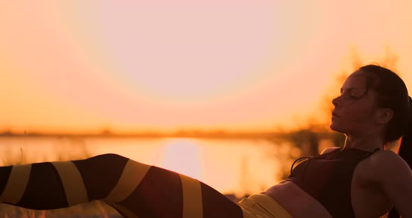 Fit Healthy Woman Stretching on Yoga Mat on Beach Seasidedoing Exercise Abdominal Crunchestraining alt