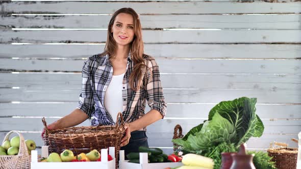 Farmer Female Holding Basket for Seasonal Vegetables Harvest alt