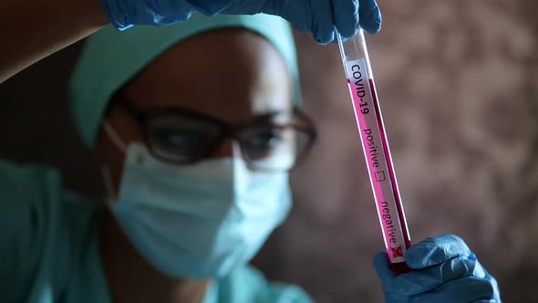 Doctor hands holding a coronavirus COVID-19 negative test tube