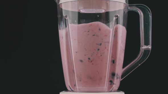 Blender Turns Berries and Milk Into a Slow Mo Milkshake alt