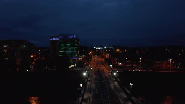 Forwards Fly Above Road Leading on Bridge alt