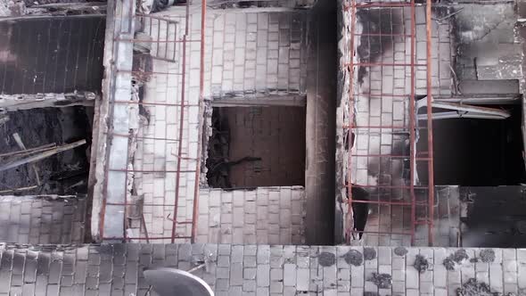 Vertical Video of Civilian Cars Destroyed During the War in Ukraine alt