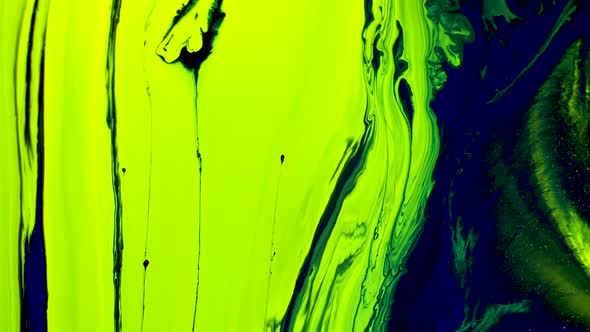 Green and Yellow liquid paint droping in Organic Shape