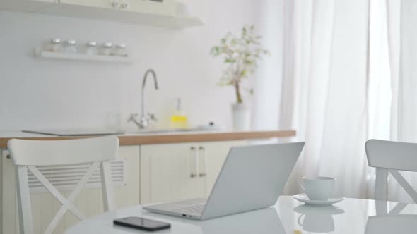 Senior Old Man Coming and Working on Laptop at Home alt