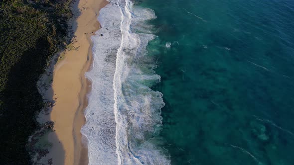 Flying along beautiful beach in Western Australia alt