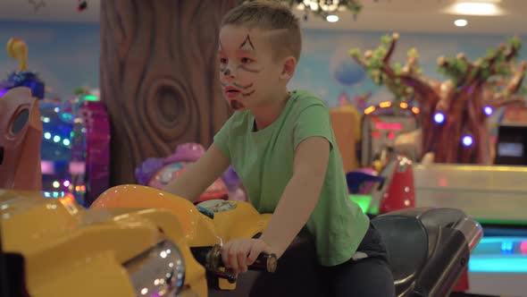 Child having fun with motorbike racing game alt