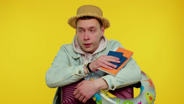 Displeased Tired Boring Traveler Tourist Teen Stylish Man in Summer Clothes on Yellow Background alt