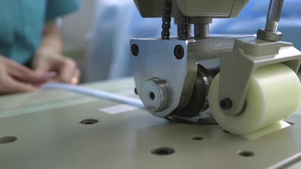 Cutting and Sewing Medical Disposable Clothing