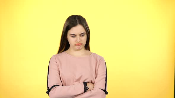 Juvenile Who Shows Diffrent Emotion on Yellow Background alt