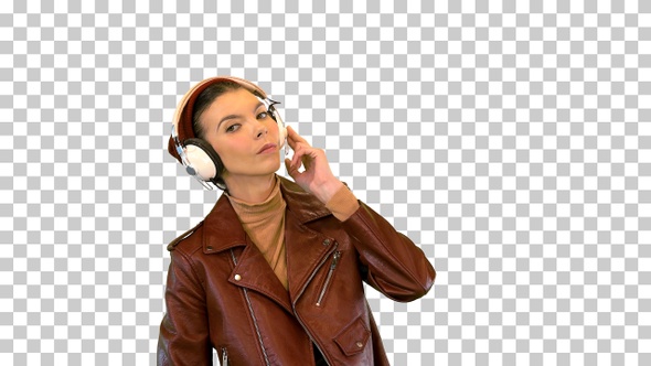 Rocker girl listening to music in headphones, Alpha Channel alt