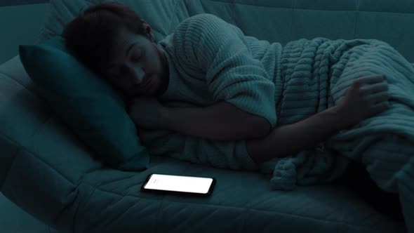 A Young Man Receives a Message About Winning a Large Amount of Money alt