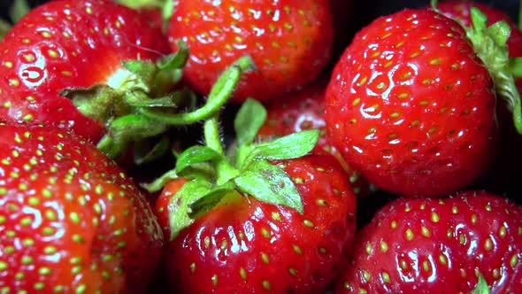 Rotation of Red Ripe Strawberries Close-up